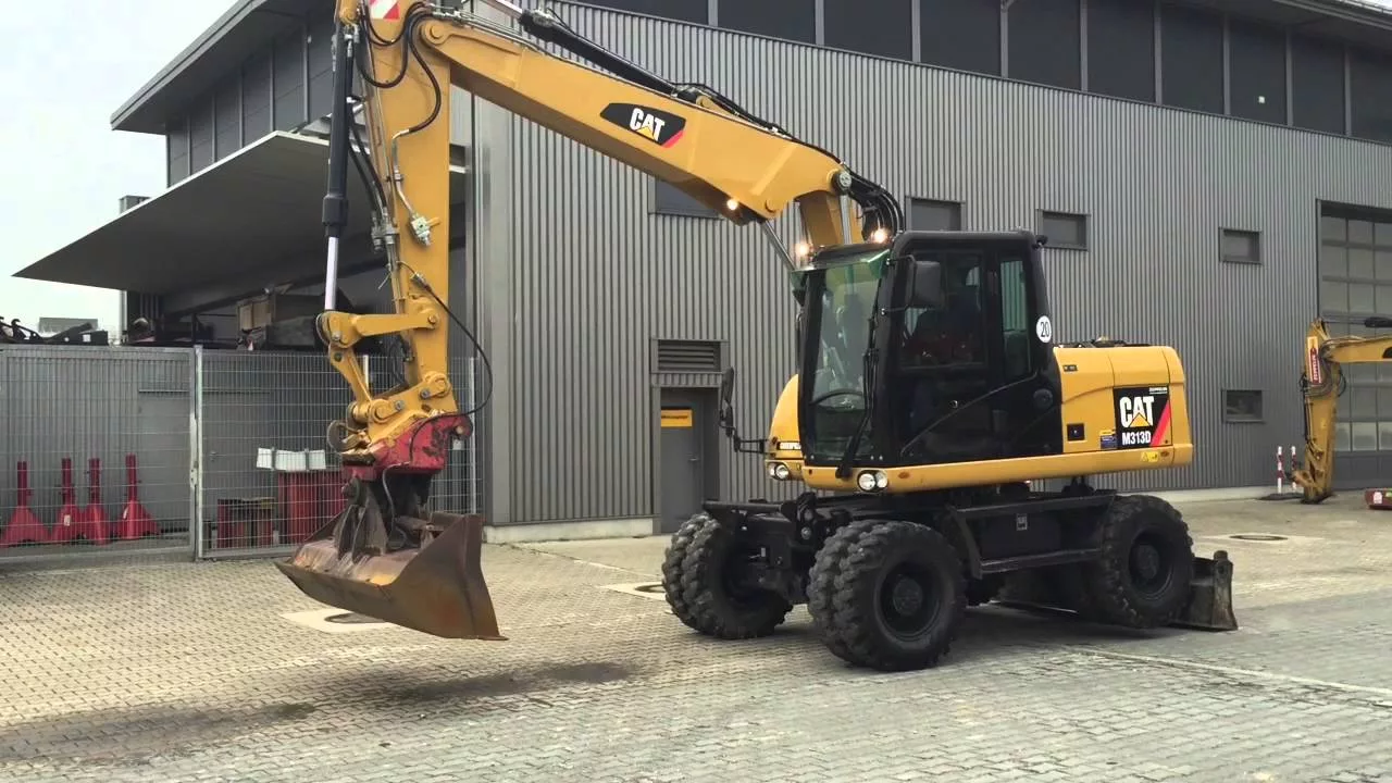 Колёсный экскаватор Cat M313D